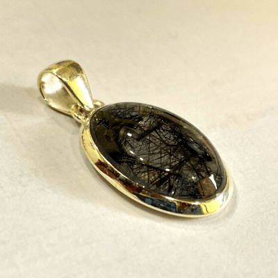 Black Rutile Silver Pendant (Oval Shape) - Himalaya Rudraksha Anusandhan Kendra